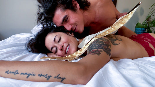 A couple exploring the physical touch love language through gentle sensation play