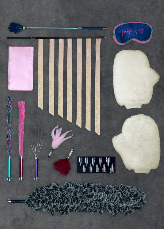 Totally Lit Kit complete sensation play set for couples - all 12 tools on white background