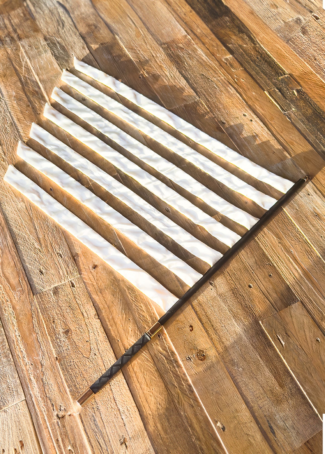 Double-O Seven satin flogger and sensual tickler from the Totally Lit Kit couples play set